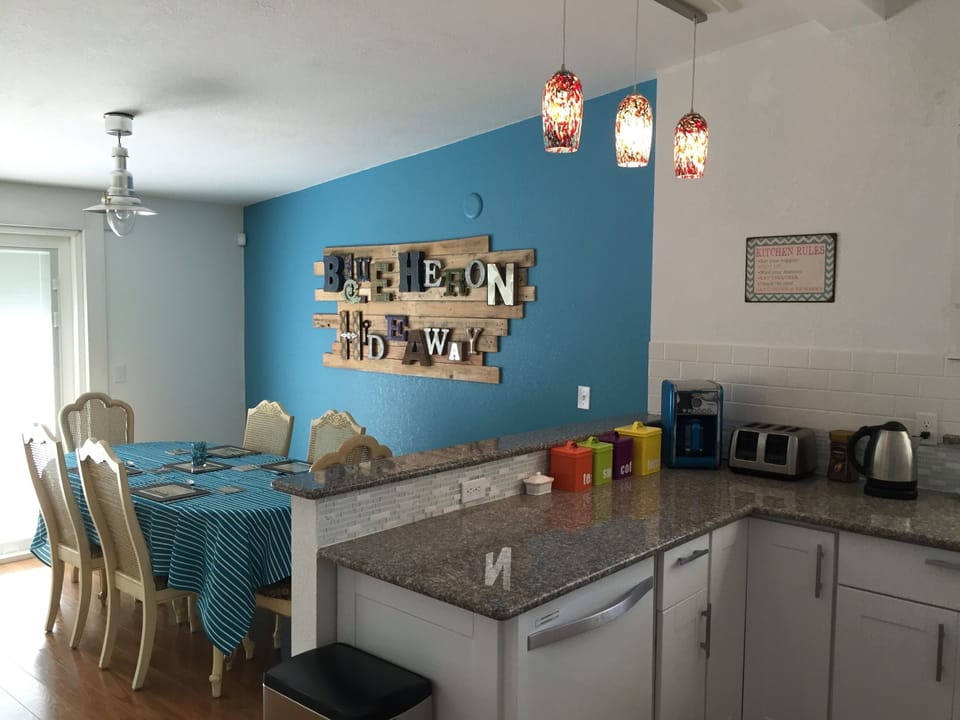 Kitchen peninsula/bar and Dining Area
