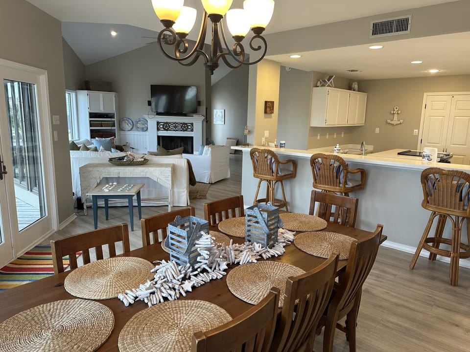 Dining room with Den and kitchen in the background