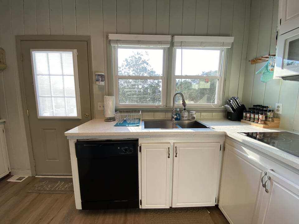 Beautiful & all new! Floor, countertops, sink, cooktop