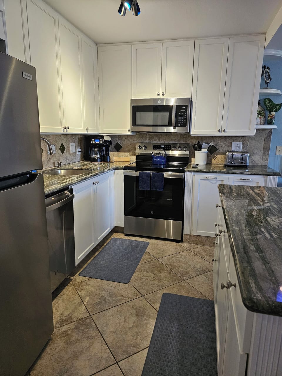 New appliances in a fully equipped kitchen 
