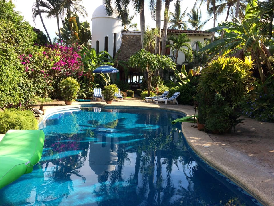 Pool on one side and beach on the other. 