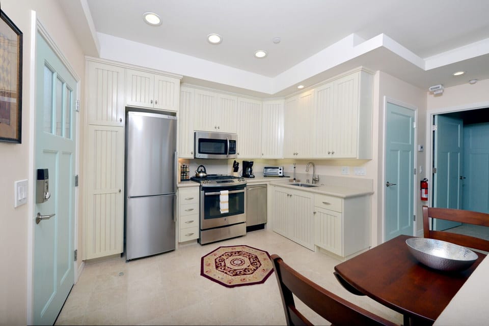The kitchen has full size appliances and opens to living room. And you still get to enjoy the great views.