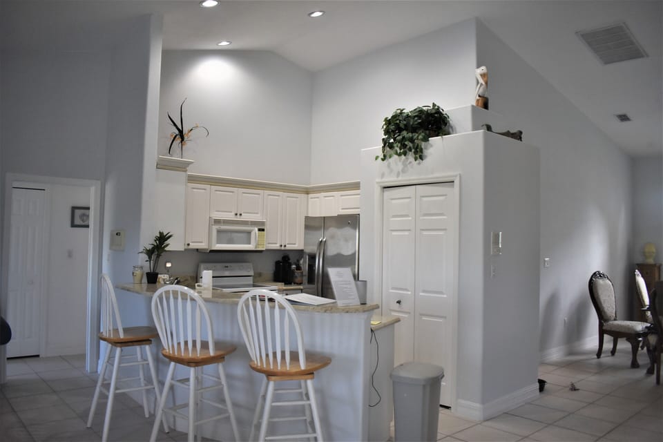 Kitchen, Dining Room to the right, & hallway to bedrooms on left