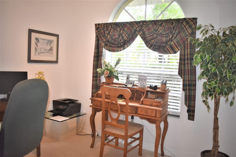 Den-Office-Study - has desk for laptop, a wireless printer