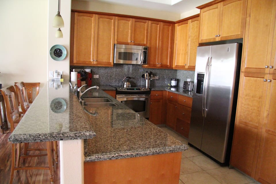 Fully stocked, state-of-the-art chef's kitchen w/granite counter tops + more!