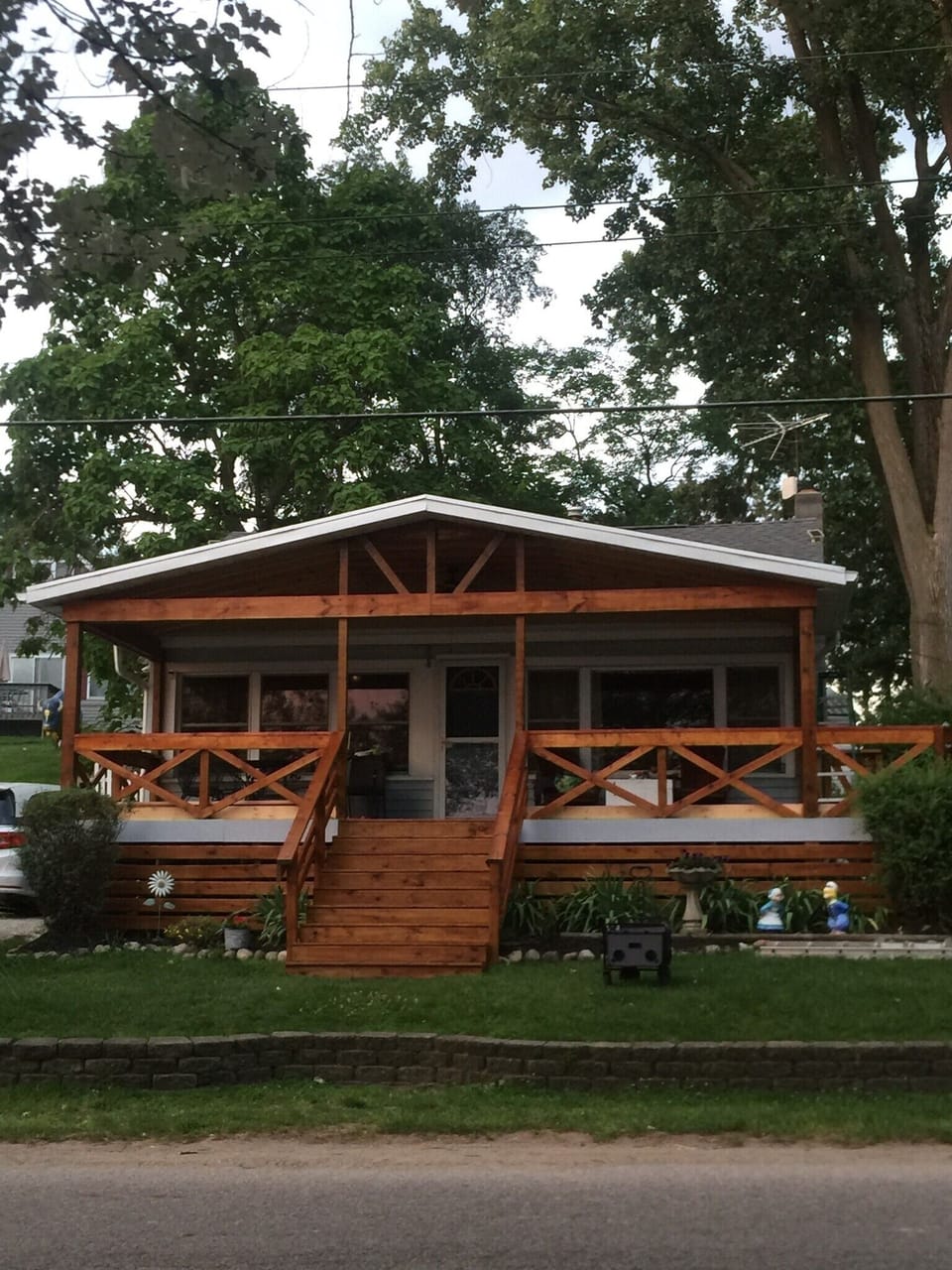 New covered deck makes lake view wonderful rain or shine.