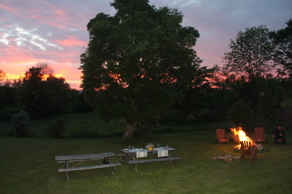 Enjoy outdoor dinners by the fire