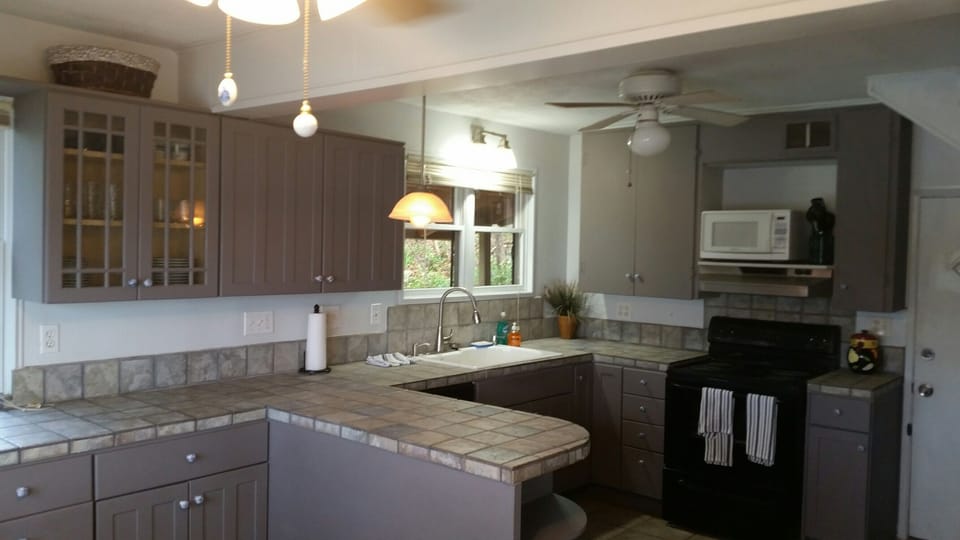 Country kitchen with SS appliances, MW, coffee maker, etc.