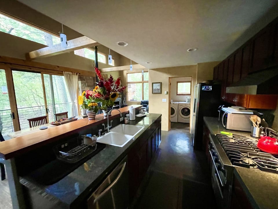 Fully stocked kitchen with Viking range. 