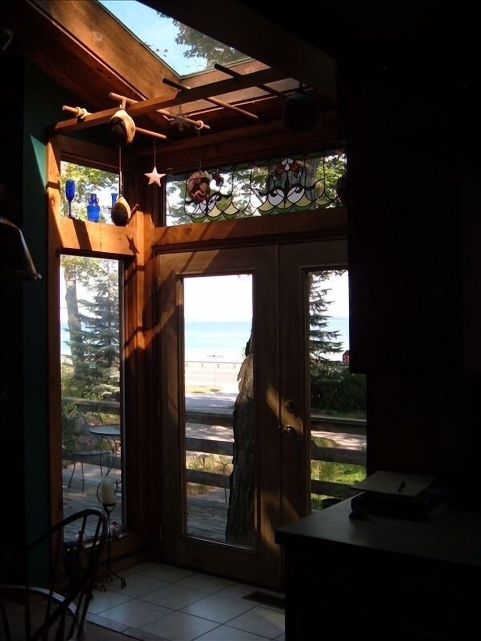 View through french doors of West Grand Traverse Bay.