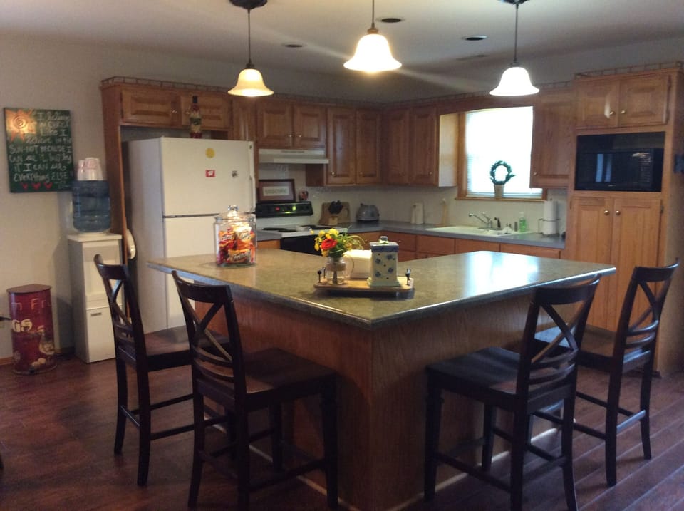 View of kitchen with bar seating