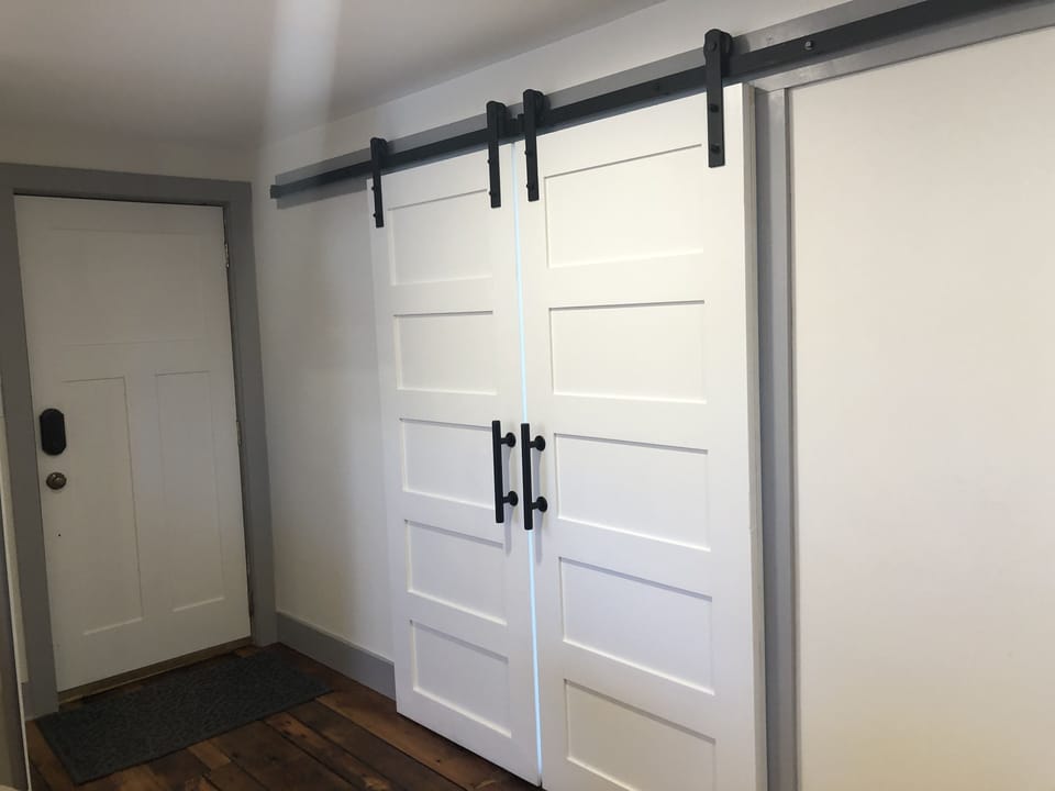 Barn doors to Keeping Room - sleeping/sitting room