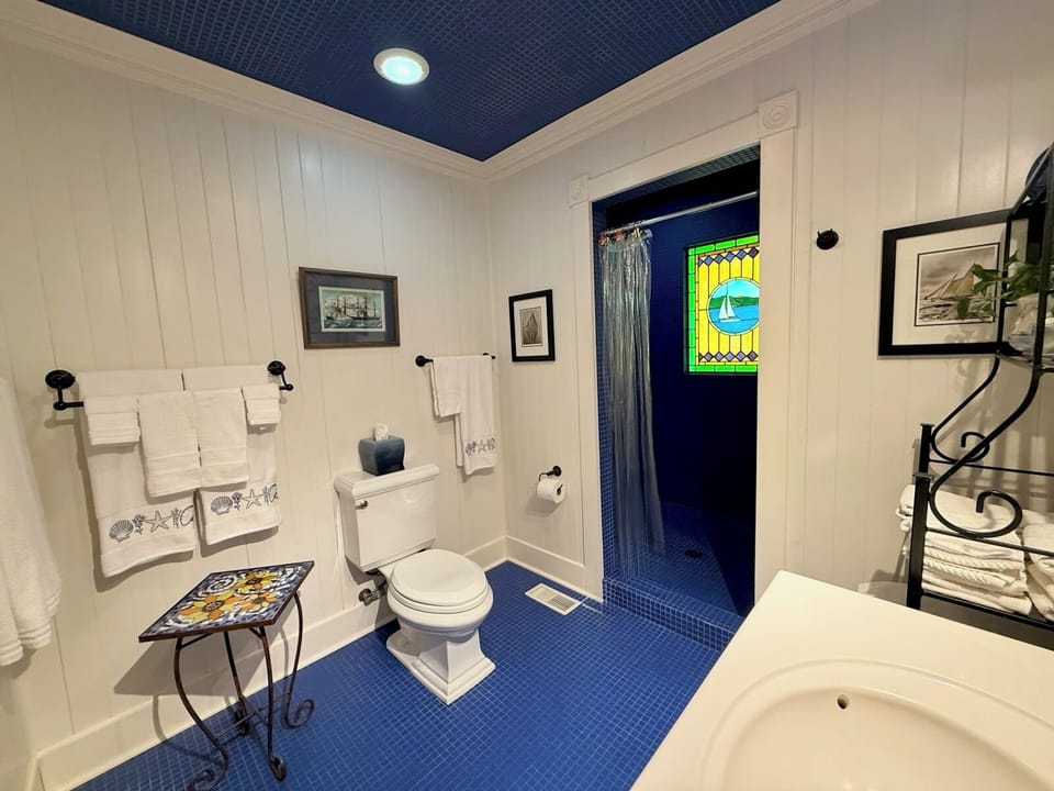 One of Two Full Bathrooms - The Upstairs  with a Large Shower.