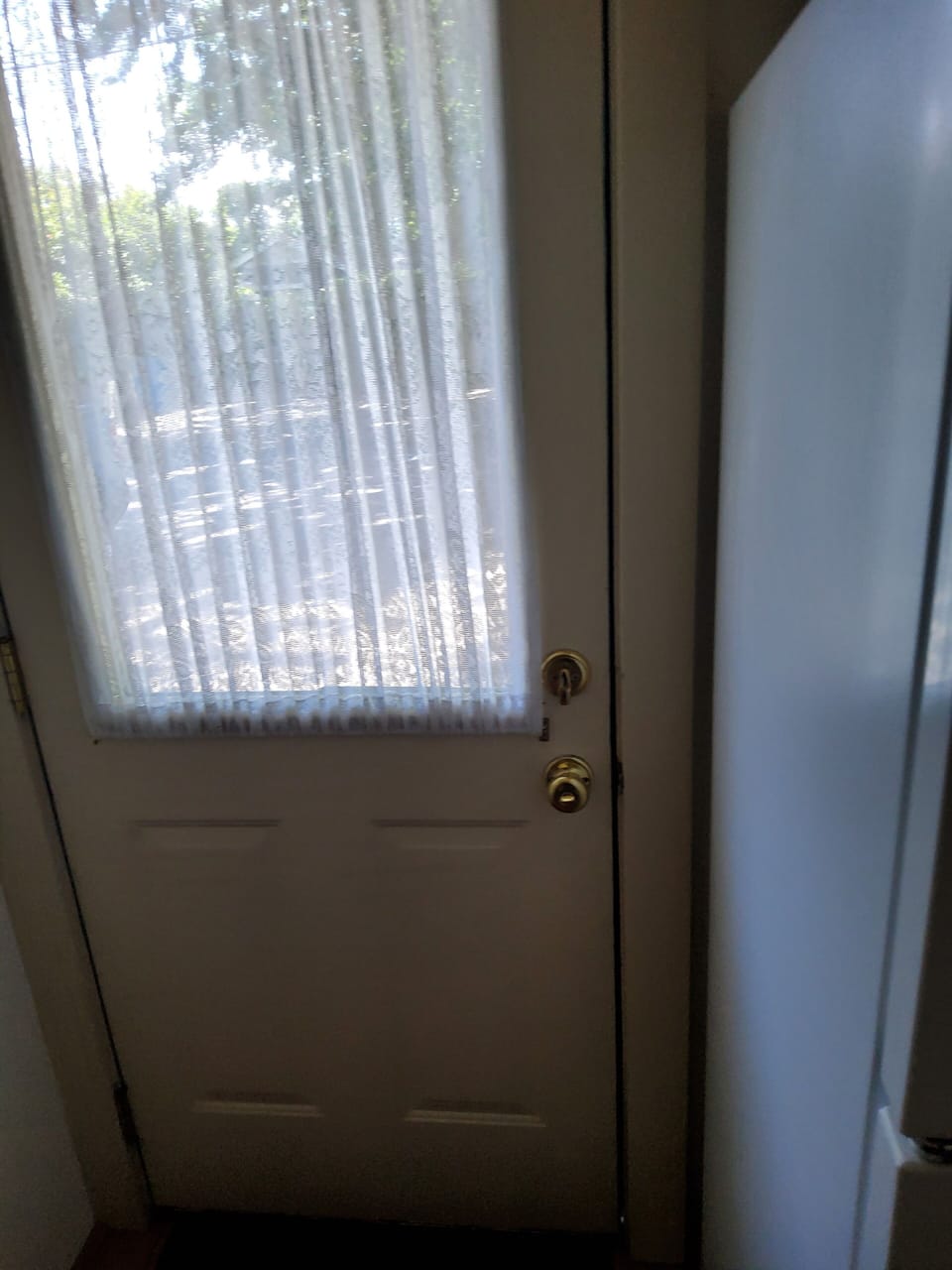 Back door to guest private parking 