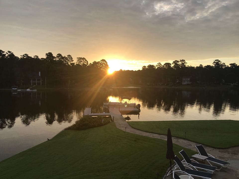 Sunrise while I'm having a hot cup of coffee sitting on my deck !