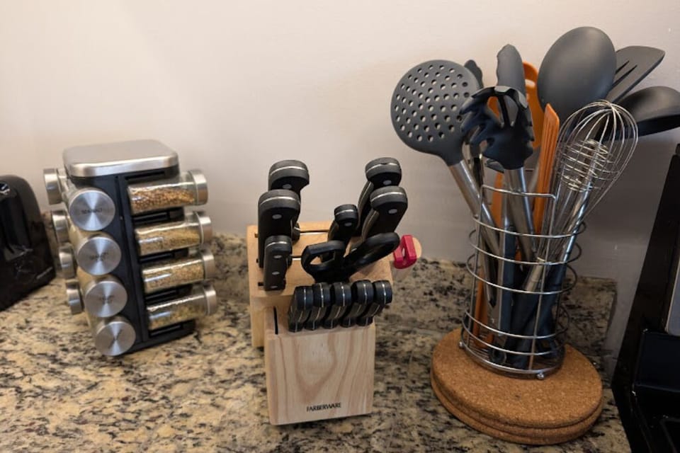 Complete with spices, a knife set and plenty of utensils for cooking.