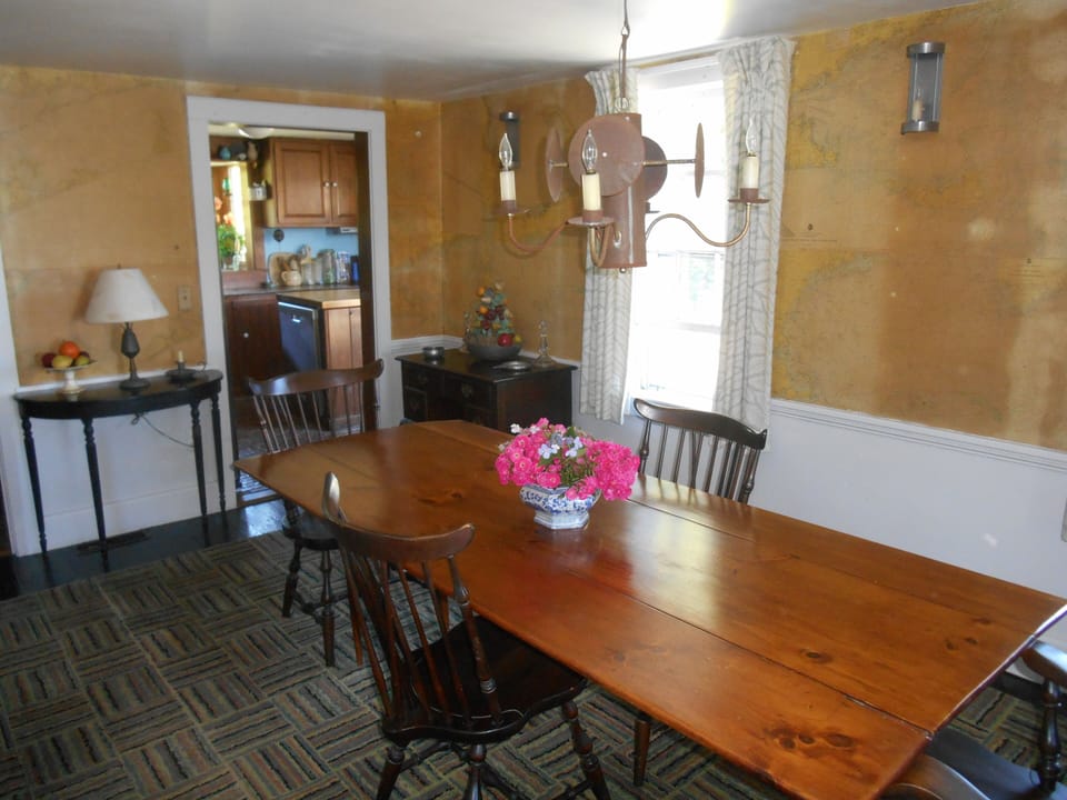 Nautical charts of New England coast and islands decorate walls - fascinating!