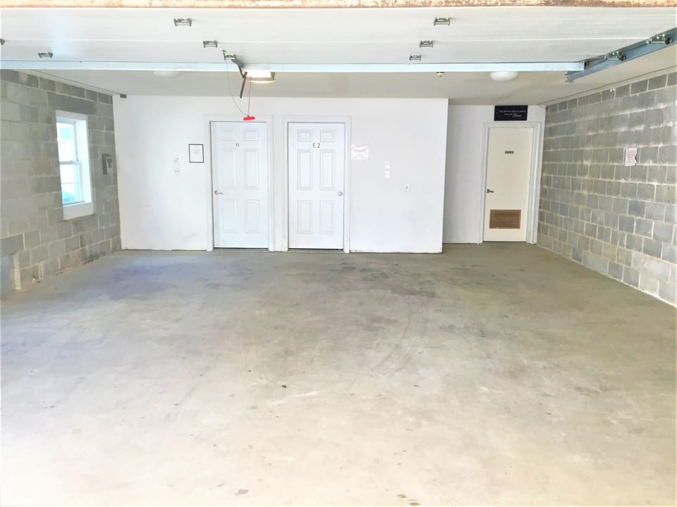Garage, Storage & Shower Rooms.
Parking for Unit E2 on right side of garage.