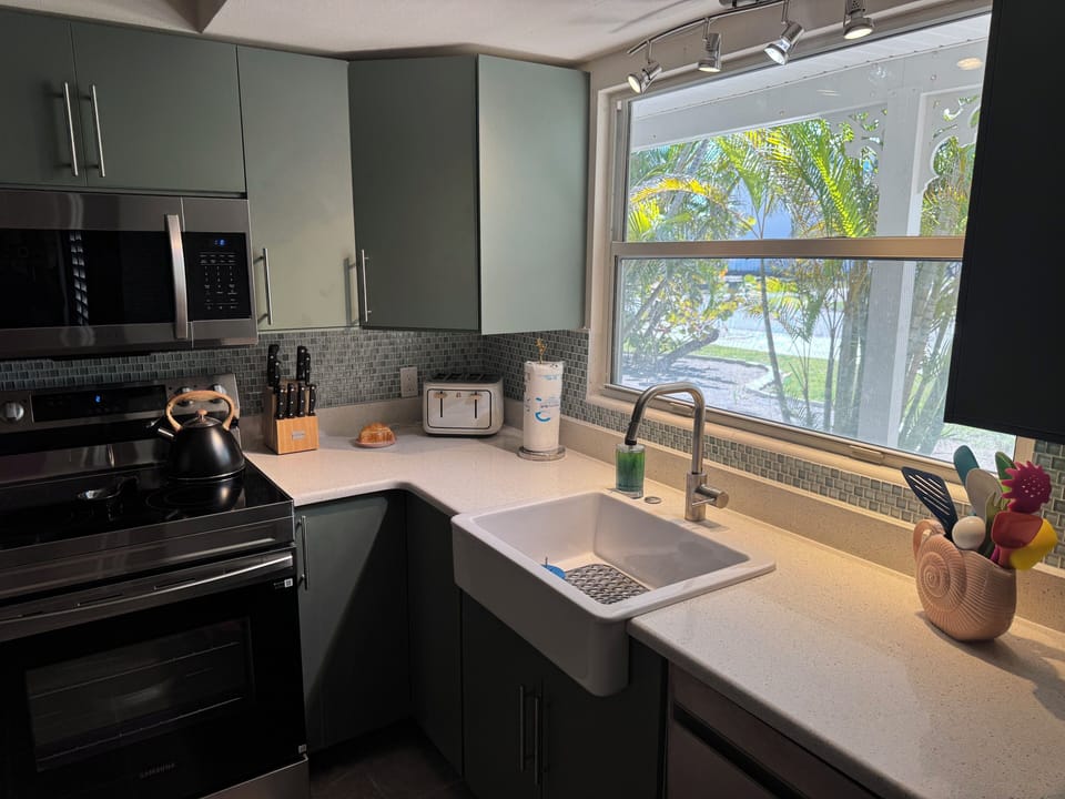 Includes garbage disposal and dish washer