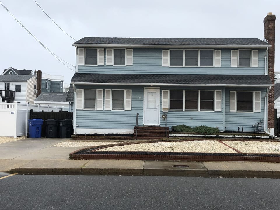 Detached home, street parking allowed, and driveway has space for 3 cars.