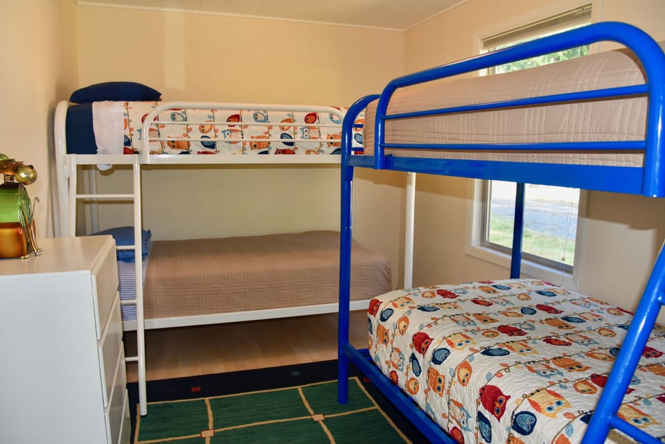 The back bedroom is perfect for children with two bunkbeds