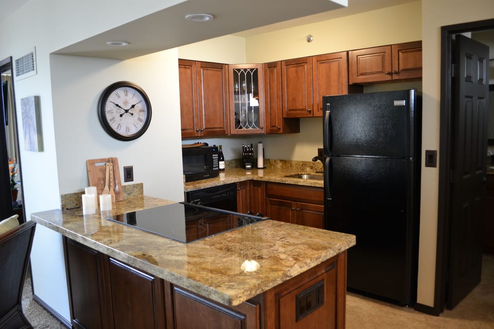 The kitchen features all new appliances, granite countertops, and new cabinetry