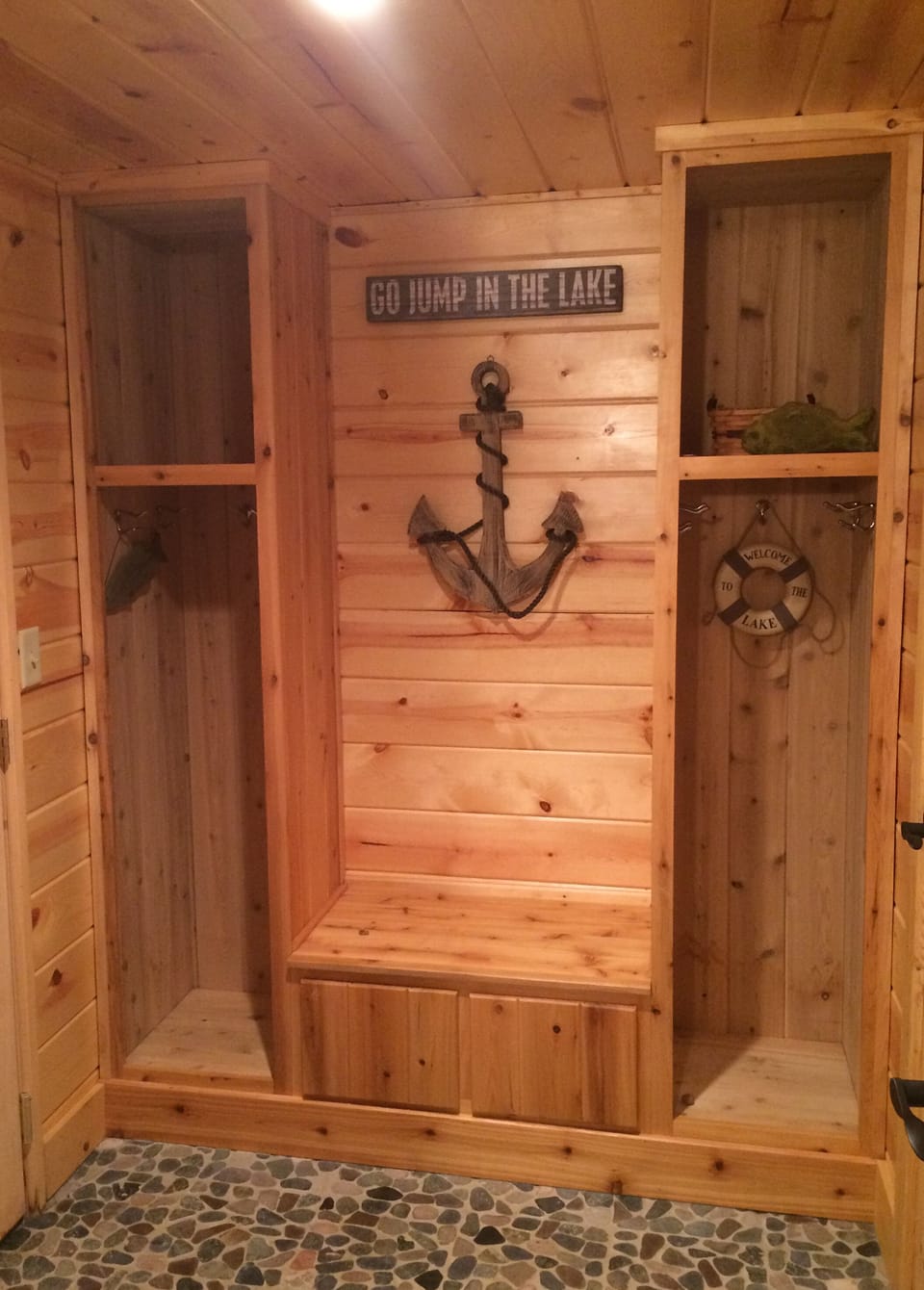 Sauna room all cedar lined with pebble floors- benches seat 6 -bathroom adjoins