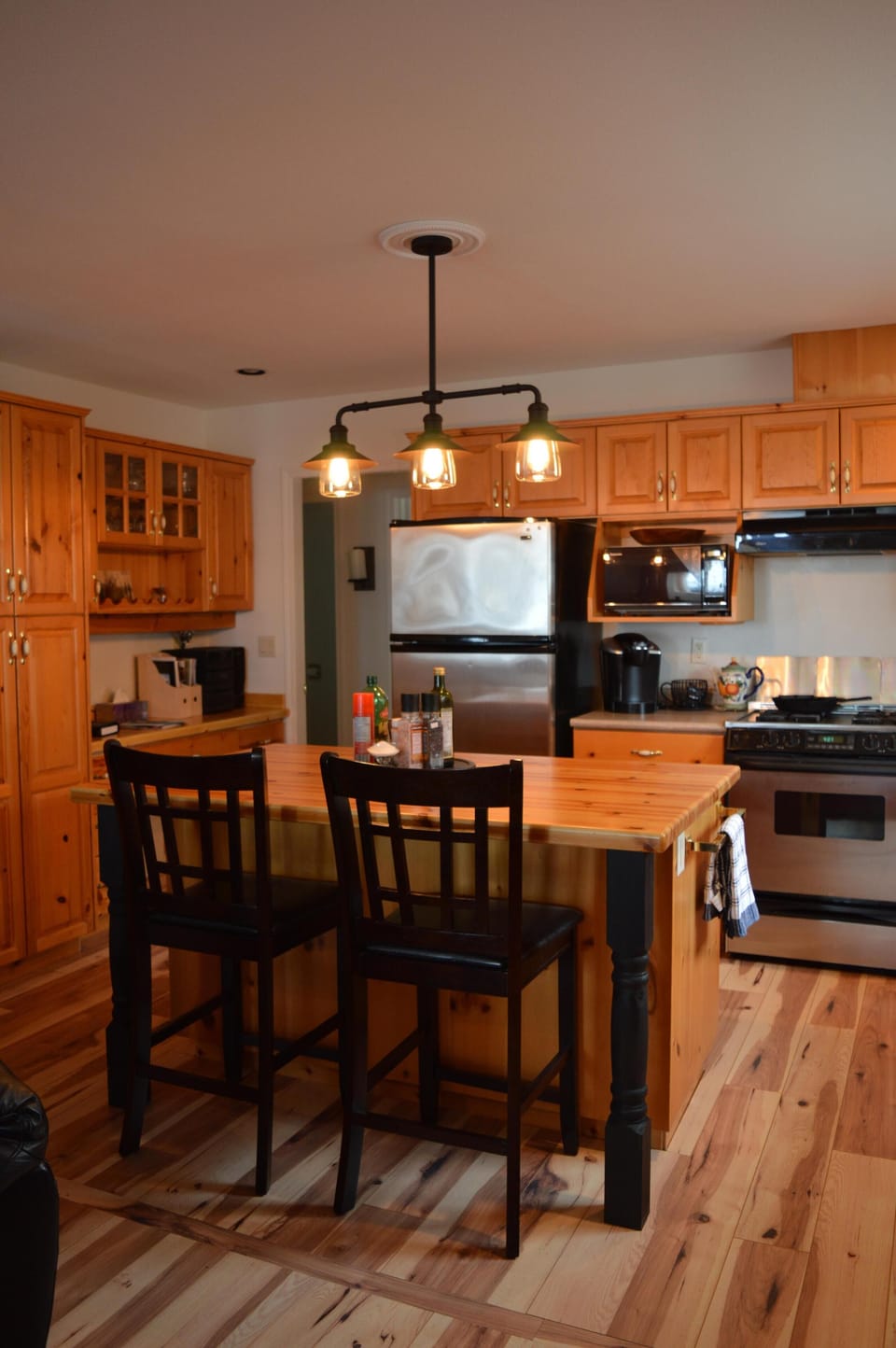 Full kitchen with stainless steel appliances, spices and other comforts.