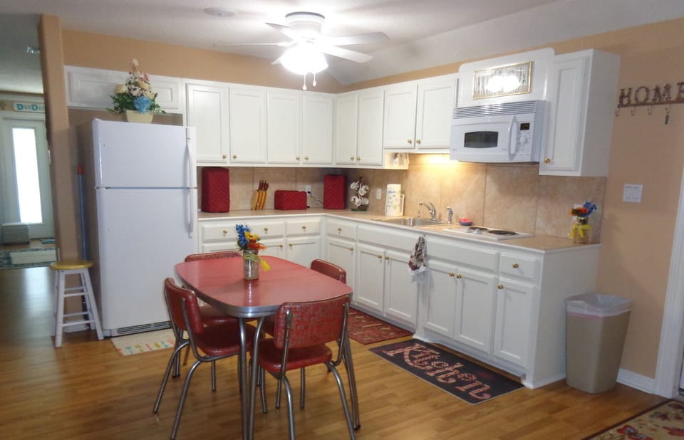 Kitchen w/ refrig/icemaker, 2 burner electric stove, convection microwave