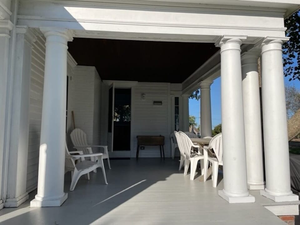 The North End porch, sheltered from the prevailing wind, with kitchen entrance 