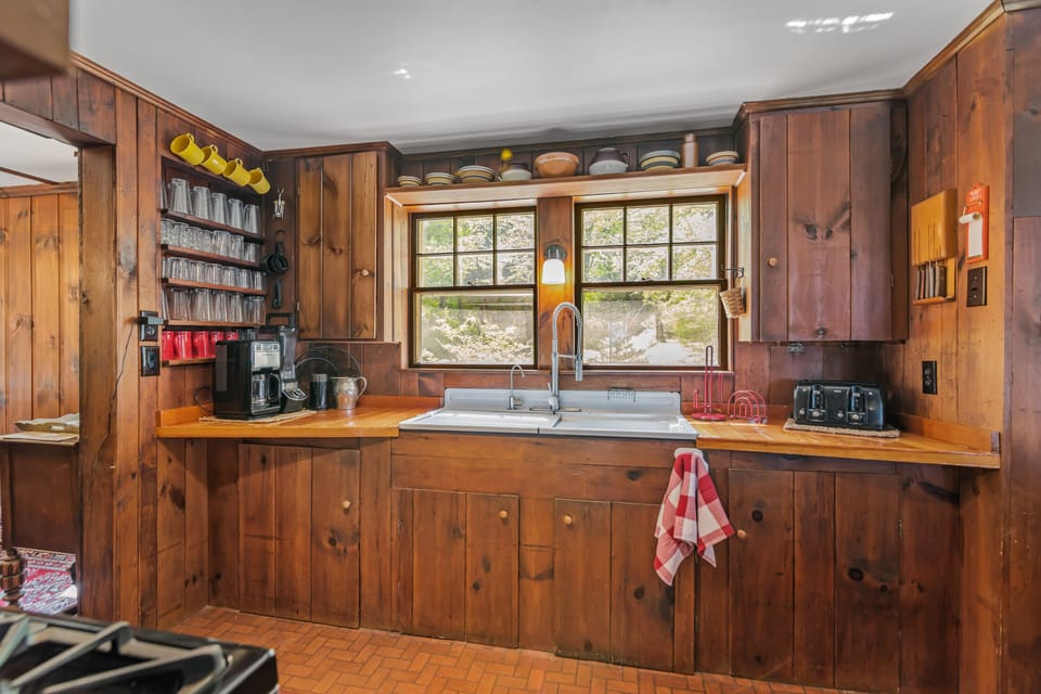 double sink with stove in foreground left corner