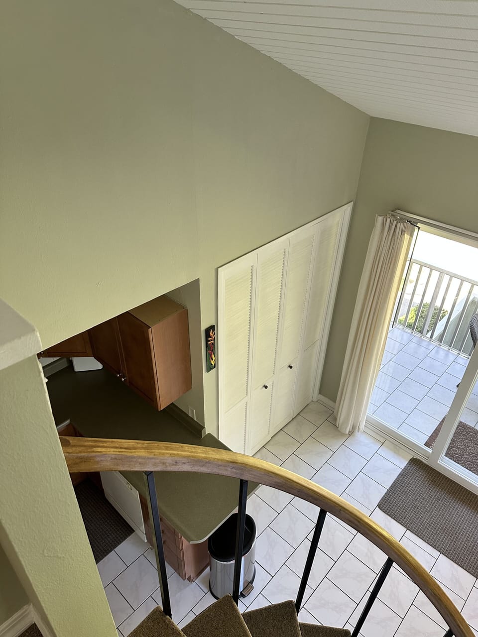 Looking down to the kitchen are from the loft bedroom 