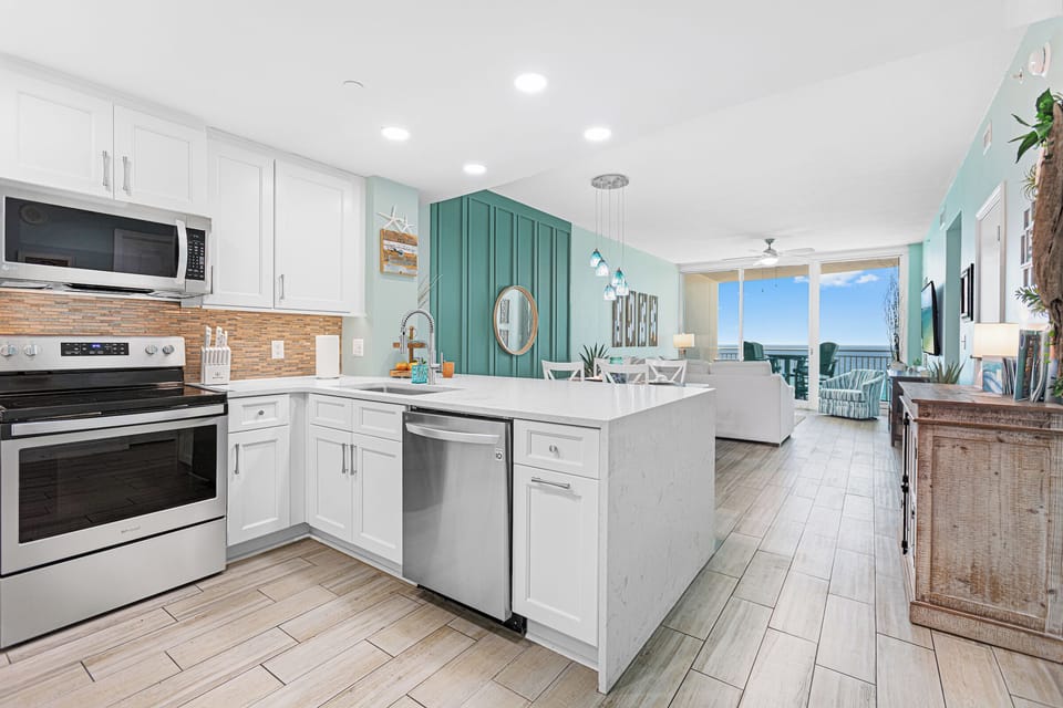 Brand NEW custom Kitchen 2024.    Quartz counter w/waterfall edge.  