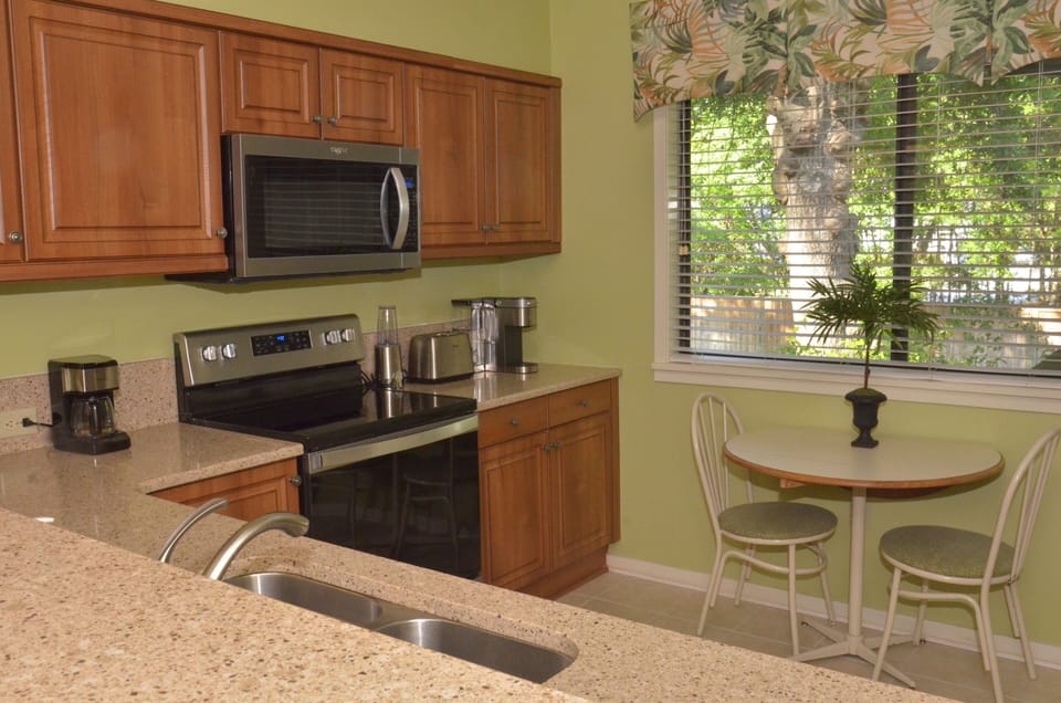 Our kitchen is fully stocked and seats 2 with a drop leaf table.
