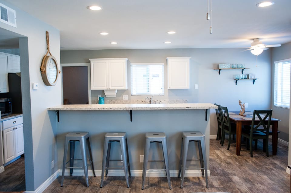 The bar can seat an additional 4 guests 