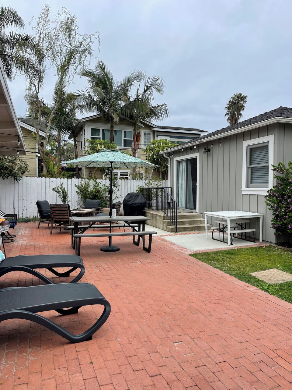 Barbeque area, fire table, patio tables, including a child picnic table.