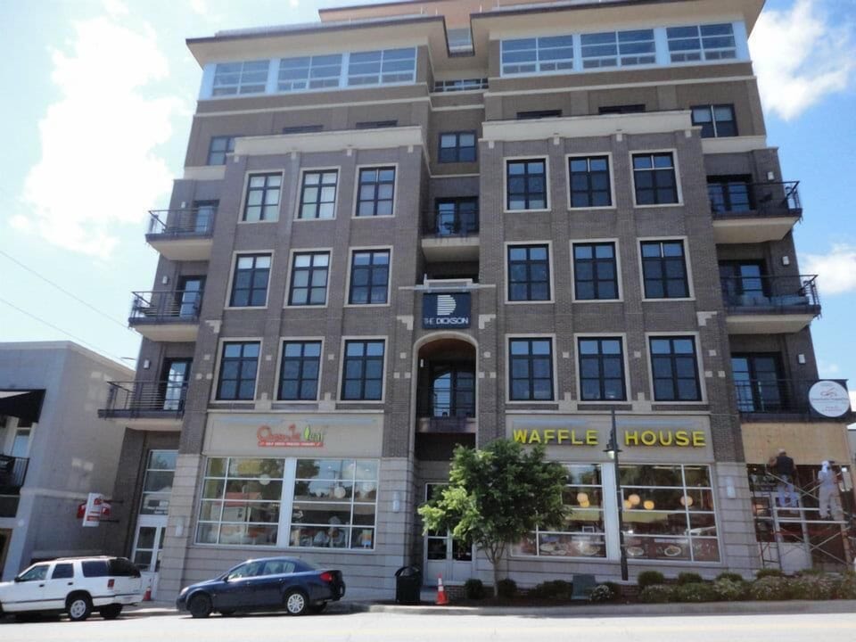 The Dickson building. Top left with porch is the condo.