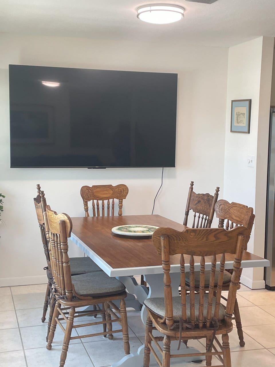 Dining room (seats 8) and 75 inch TV