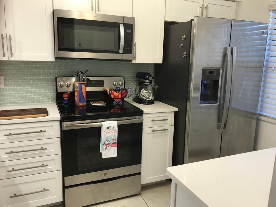 Stainless appliances. Frig has icemaker and filtered water.  Kitchen Aid mixer.