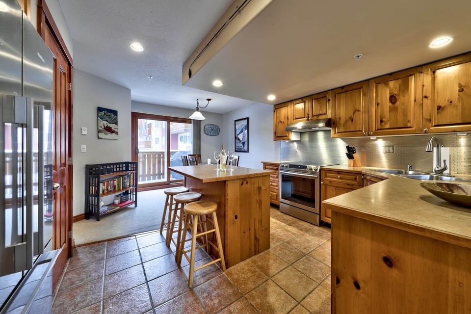 Open space concept where family and friends cook, eat and play together.