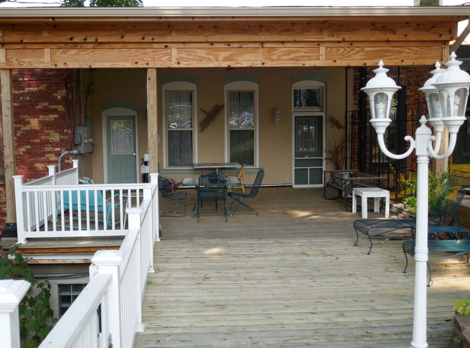 Private parking leads to covered deck and 2 entrances to The Place.
