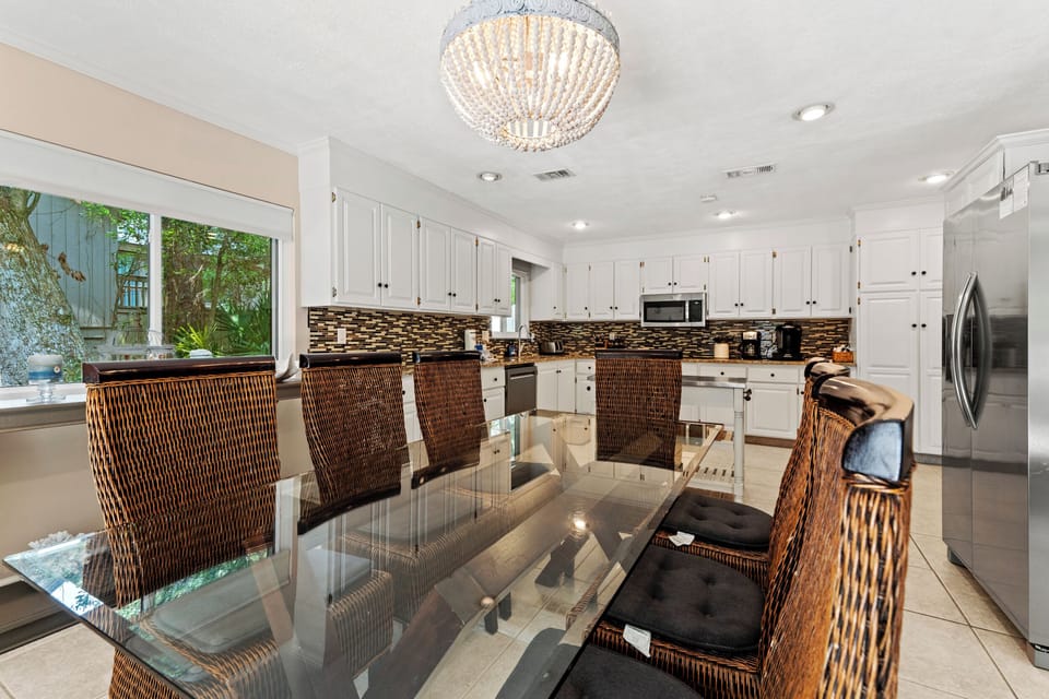 Dining area attached to open concept kitchen.