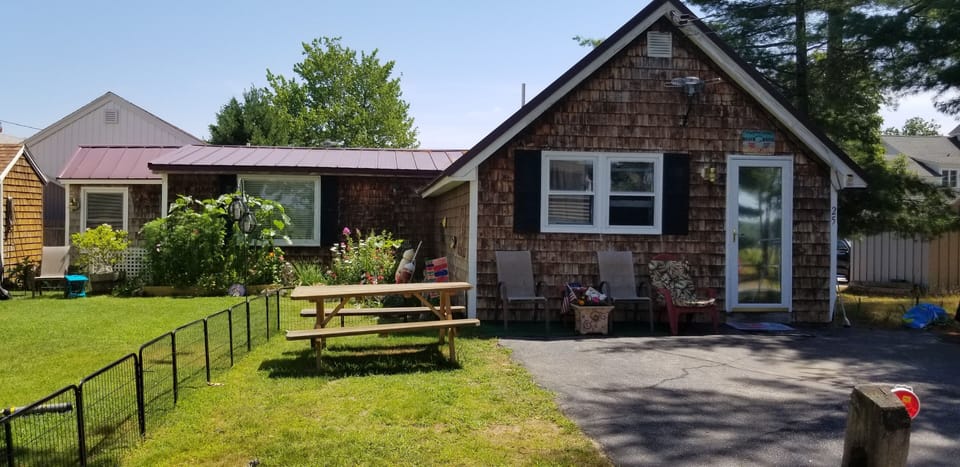 Aprx 200 sq grass area for guests that includes a picnic table, grill.  
