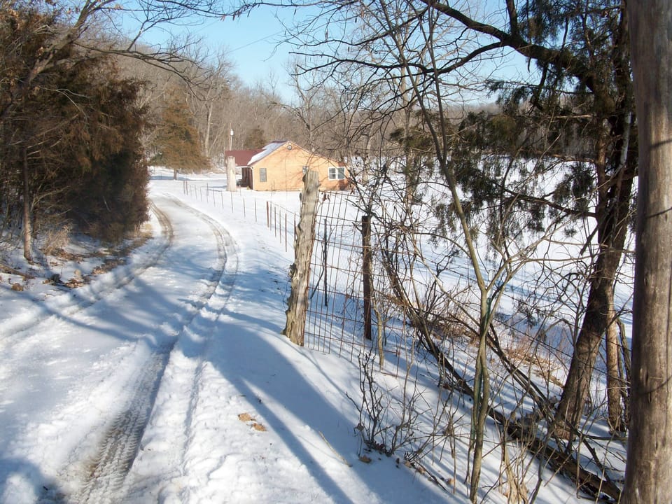 A winter view of the cabin!  Coming down the snowy lane.