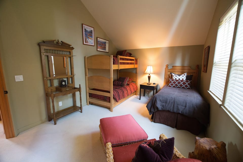 The twin room features the 2 bunks, the separate twin and the rollout trundle