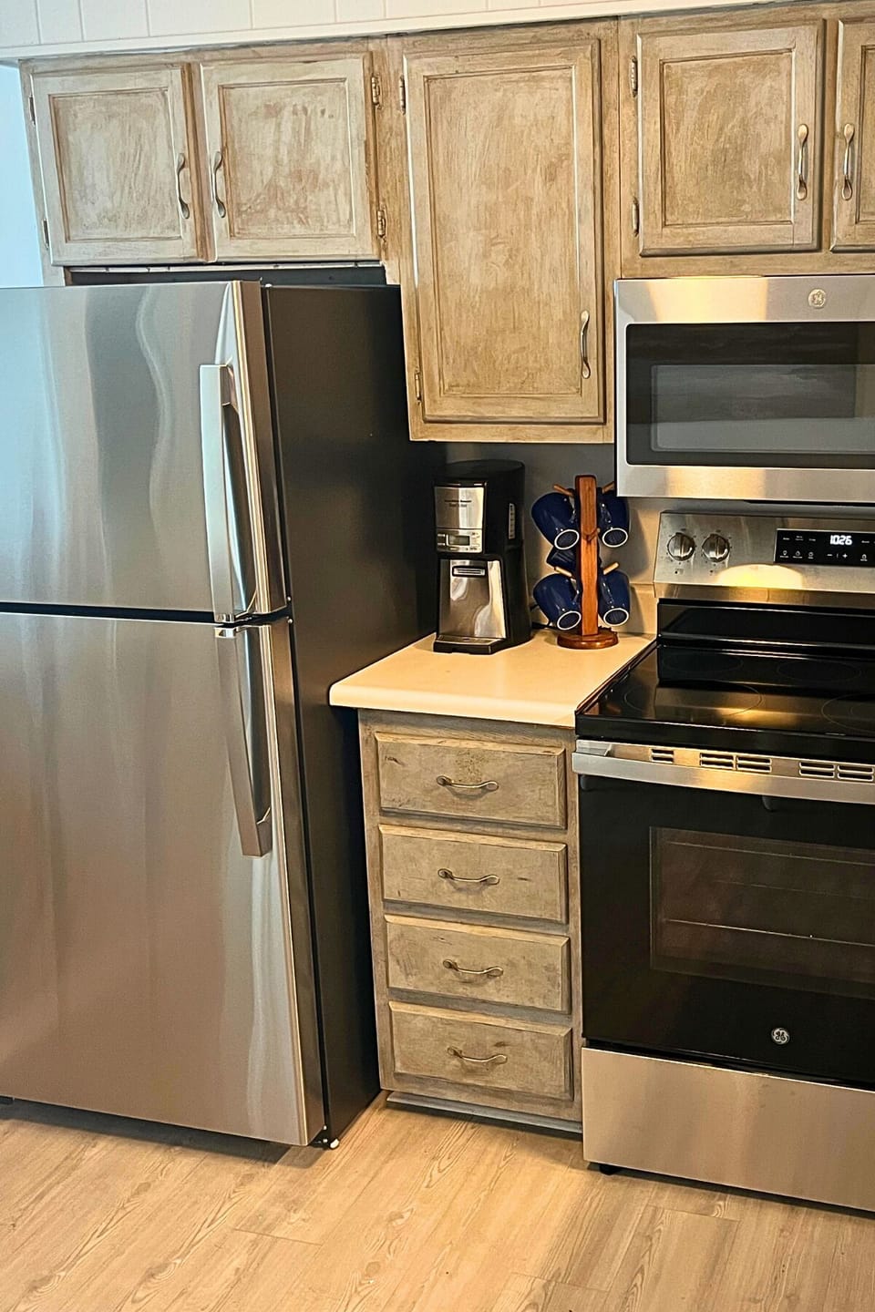Fully-equipped kitchen with new appliances in 2025, including a Ninja blender.