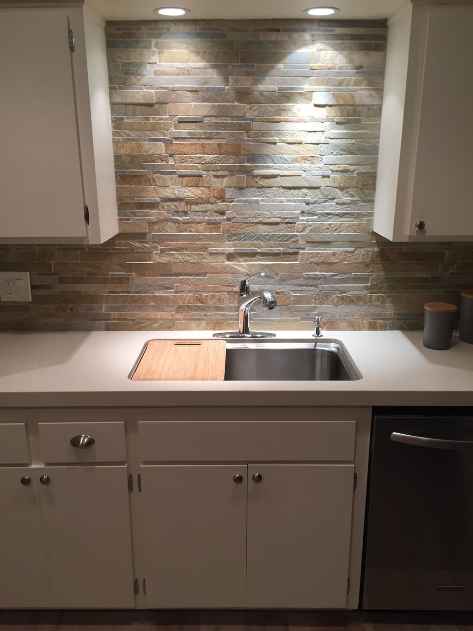Sink has cutting board and colander built in! They can be removed for extra room