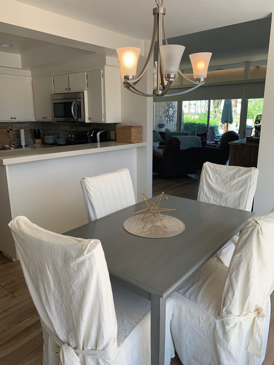 New kitchen table for four so that there is ample room to access int. courtyard.
