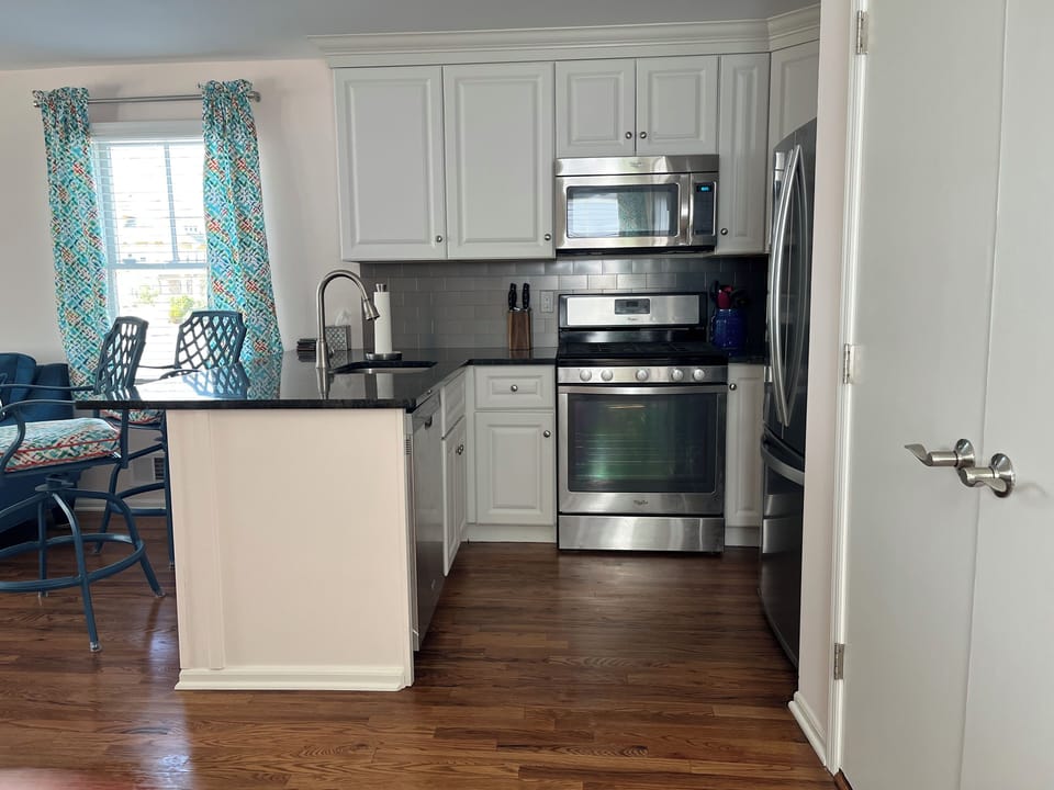 Gas range with built in microwave hood and dishwasher