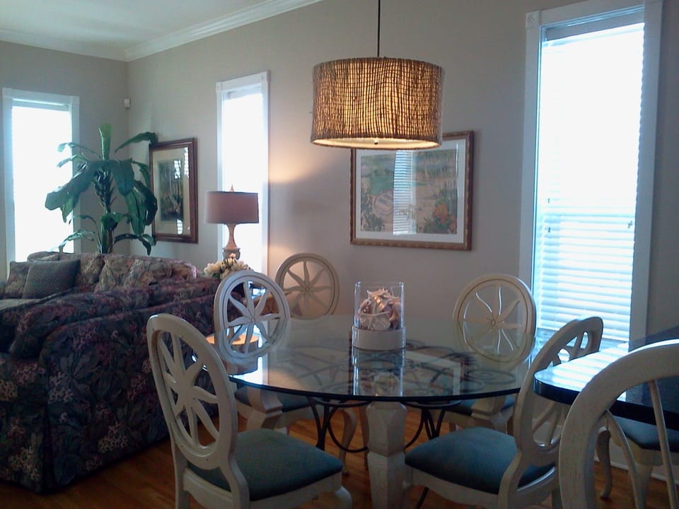 Dining area that seats six. Two bar stools at breakfast bar. Seats eight.